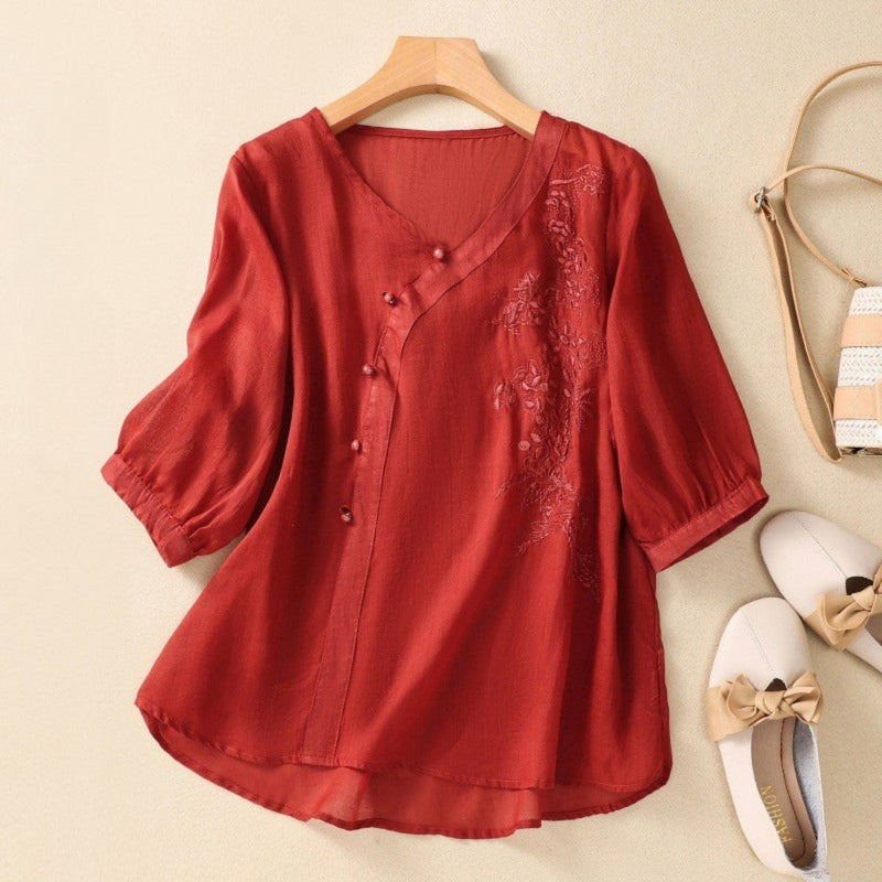 Elegant asymmetrisk tunika med knapper