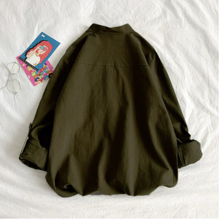 Forårsbluse med praktisk lomme design