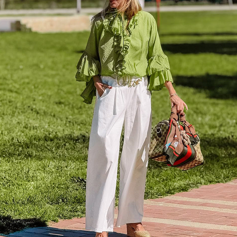 Kvinders bluse med stilfulde flæseærmer